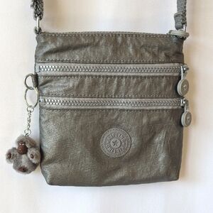 Kipling Silver Crossbody Bag with Adjustable Straps and Monkey Charm Keiko